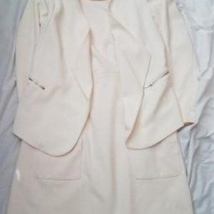 Cream color dresssuit from white/black store.